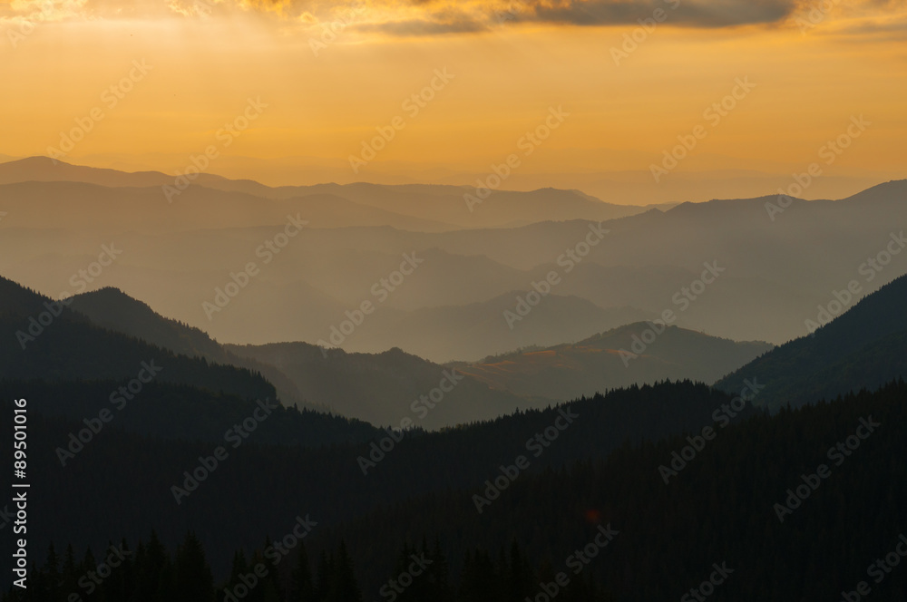 Sunrise over Carpathian mountain range in Romania