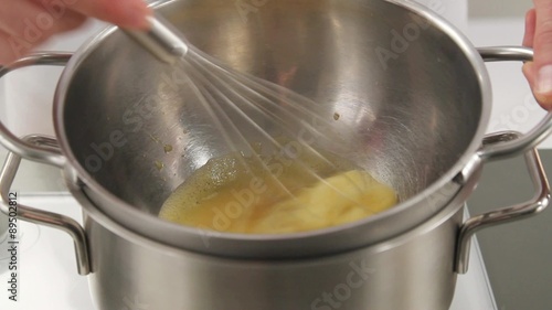 Bearnaise sauce being heated in a bain marie