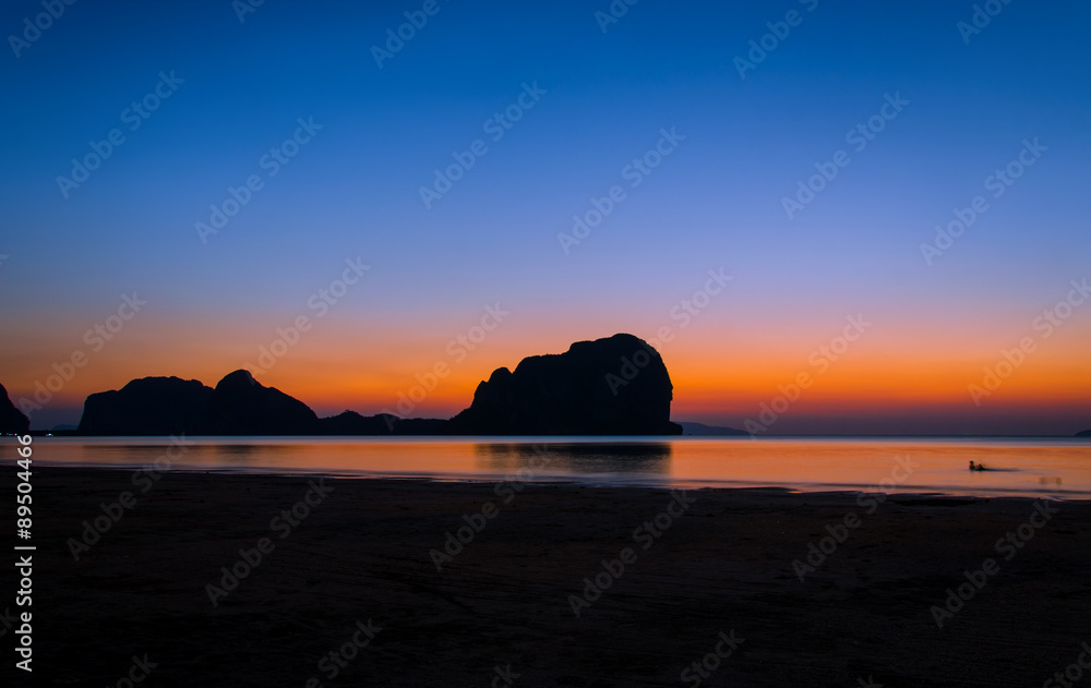 sunset on the beach of andaman sea