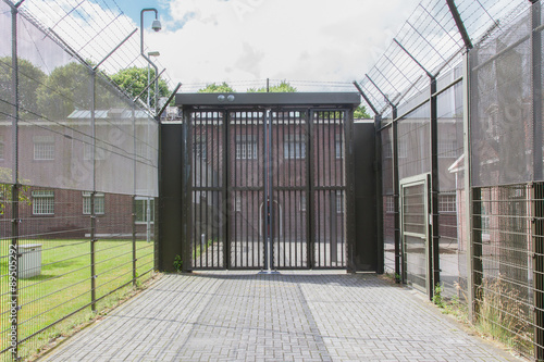 Fototapeta Naklejka Na Ścianę i Meble -  Large gate at an old jail