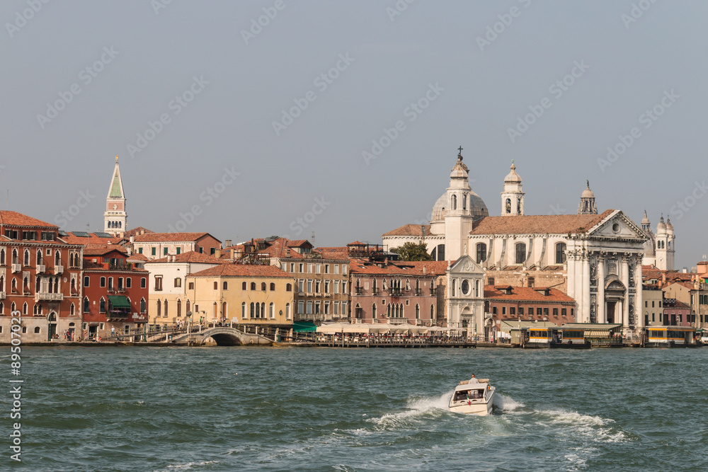 motor boat crossing Grand canal in Venice
