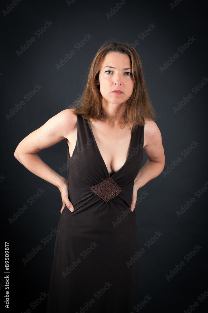 Beautiful woman doing different expressions in different sets of clothes: angry Beautiful woman doing different expressions in different sets of clothes: angry
