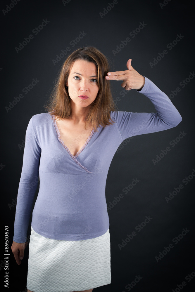 Beautiful woman doing different expressions in different sets of clothes: suicide Beautiful woman doing different expressions in different sets of clothes: suicide