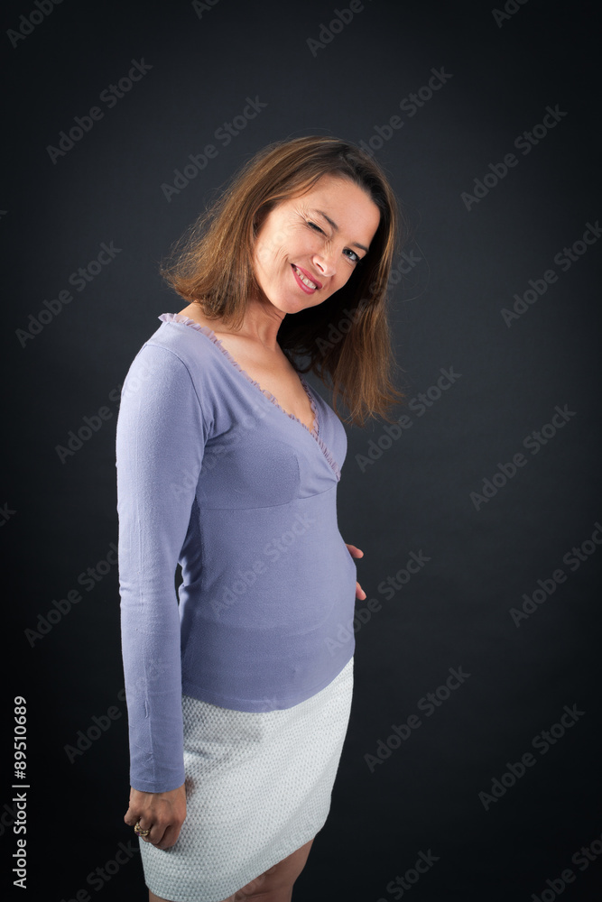 Beautiful woman doing different expressions in different sets of clothes: blinking Beautiful woman doing different expressions in different sets of clothes: blinking