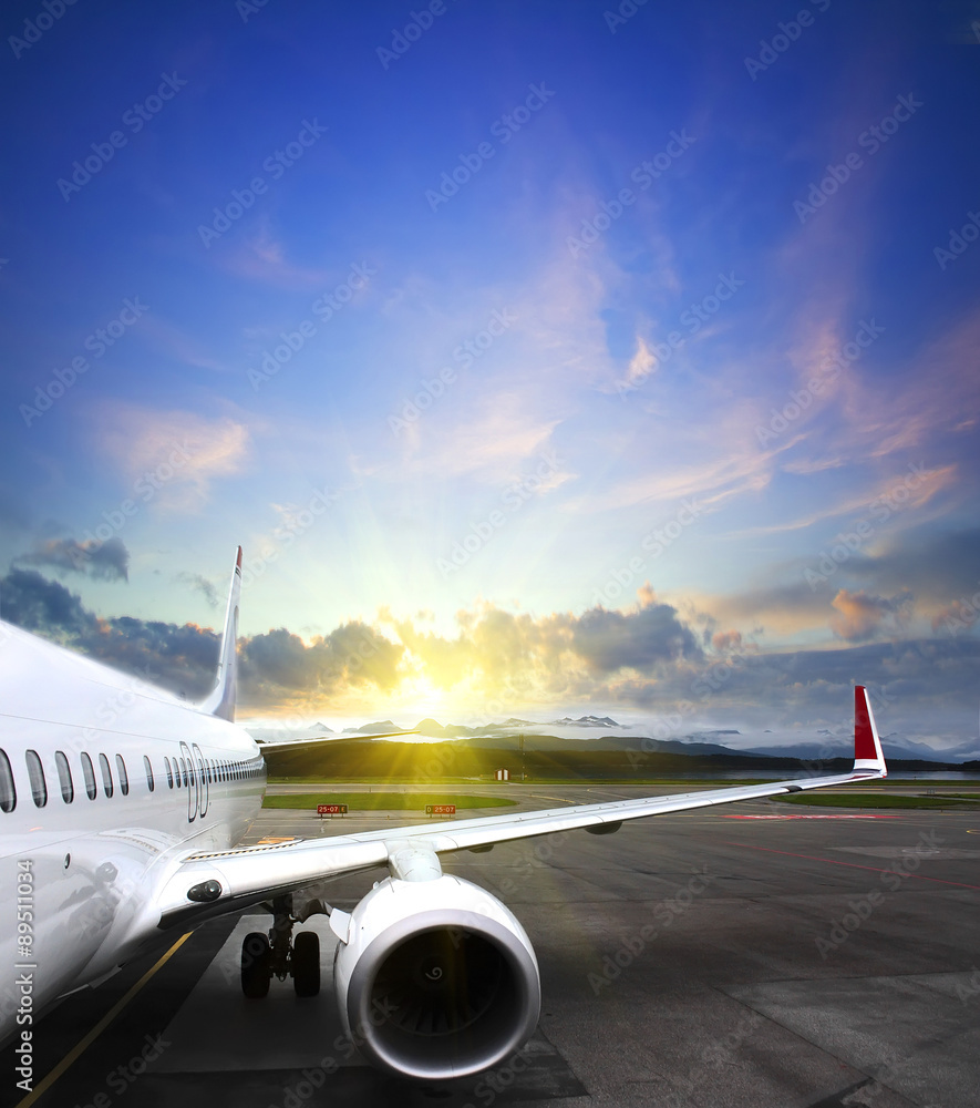 Fototapeta premium airplane wing at airport. vintage business travel concept