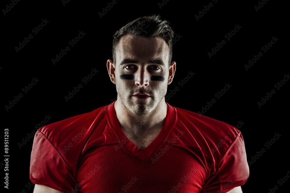 Obraz premium American football player looking at camera