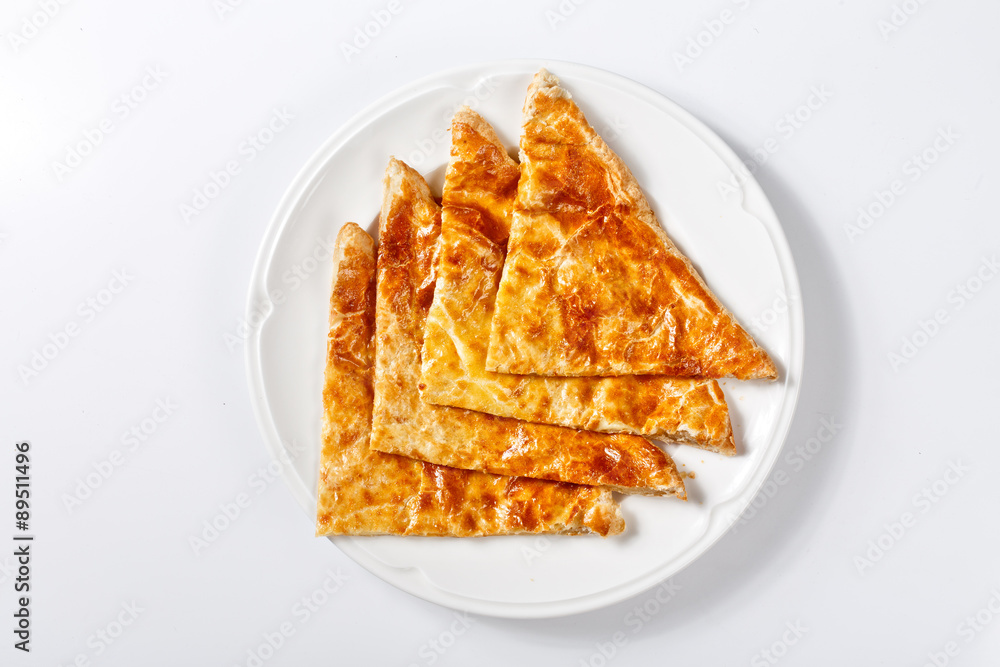 georgian traditional khachapuri on plate on white background. As georgian traditional khachapuri on plate on white background. As