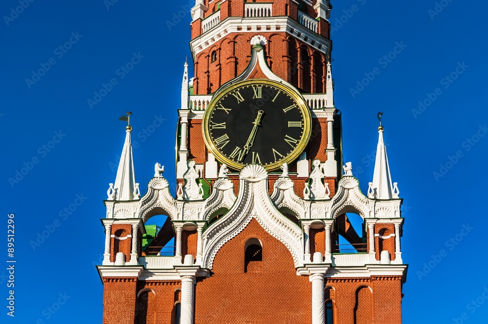 Spasskaya tower and large clock of Kremlin on Red Square in Mosc