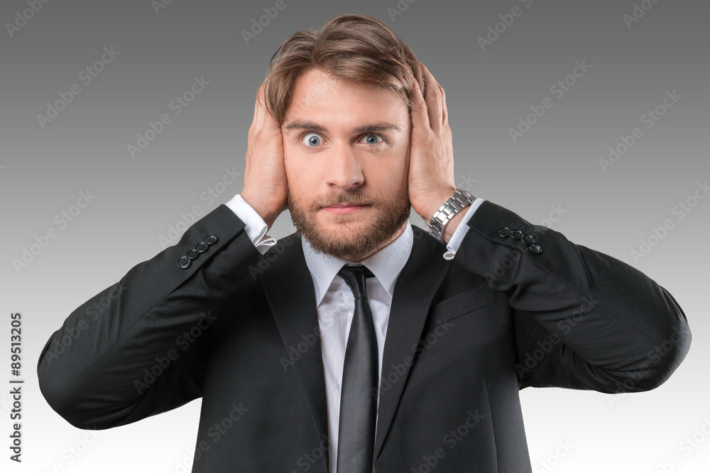Businessman closing ears, doesn't want to hear Businessman closing ears, doesn't want to hear
