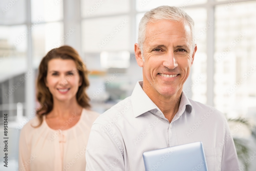 Casual business colleagues smiling at camera Casual business colleagues smiling at camera