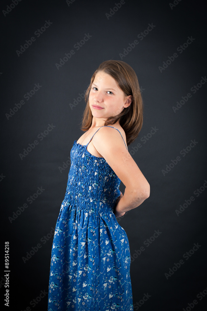 Beautiful girl doing different expressions in different sets of clothes: backache Beautiful girl doing different expressions in different sets of clothes: backache