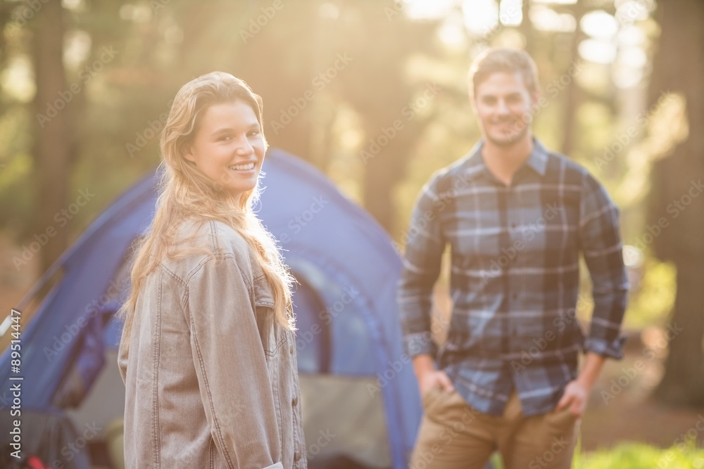 Happy young camper couple smiling Happy young camper couple smiling