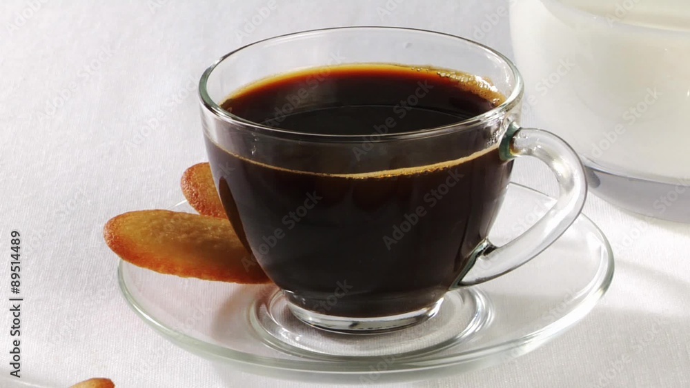 A cup of coffee with biscuits A cup of coffee with biscuits
