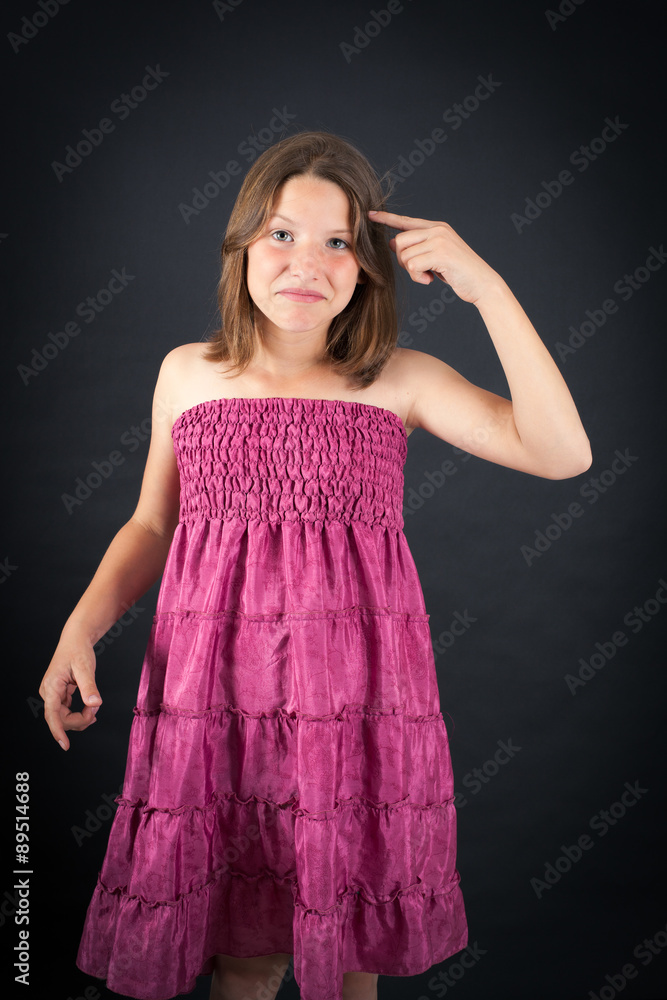 Beautiful girl doing different expressions in different sets of clothes: you are crazy