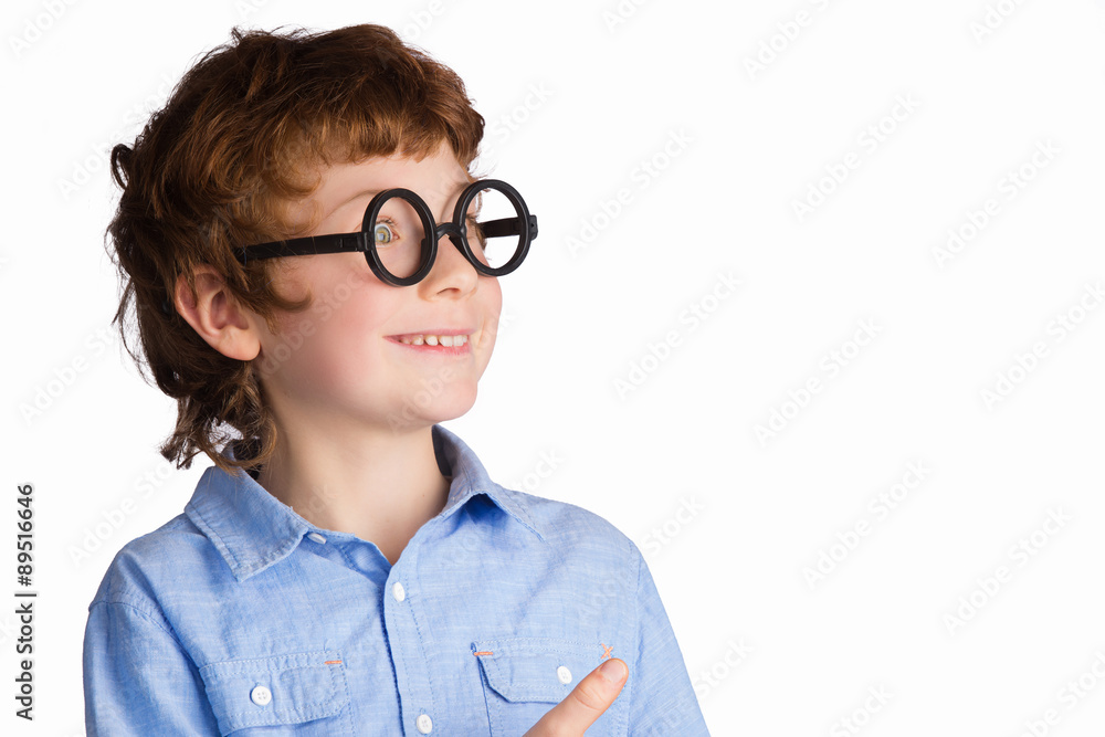 Portrait of handsome smiling boy in round glasses. Isolated on