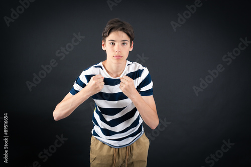 Handsome boy doing different expressions in different sets of clothes: boxe