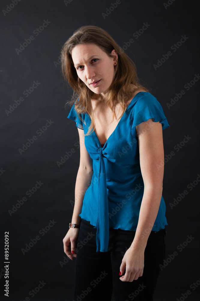 Beautiful woman doing different expressions in different sets of clothes: tired