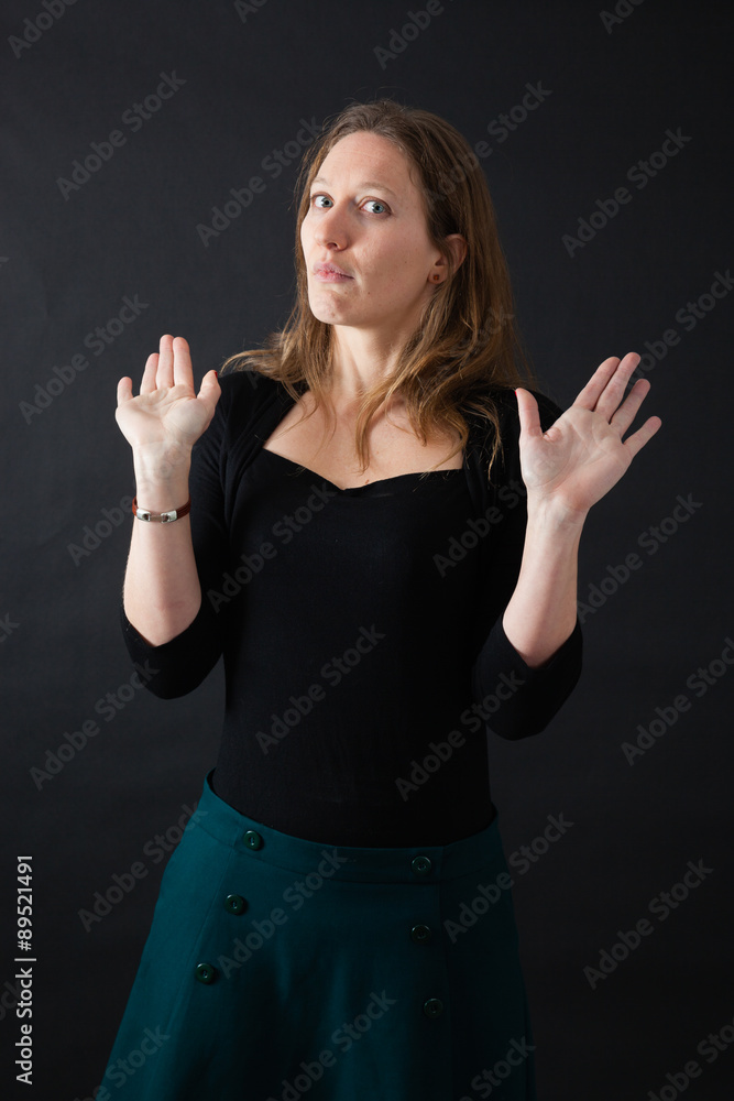 Beautiful woman doing different expressions in different sets of clothes: innocent Beautiful woman doing different expressions in different sets of clothes: innocent