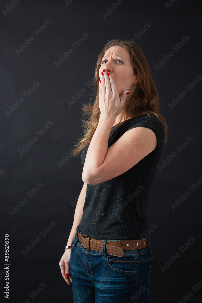 Beautiful woman doing different expressions in different sets of clothes: yawn Beautiful woman doing different expressions in different sets of clothes: yawn