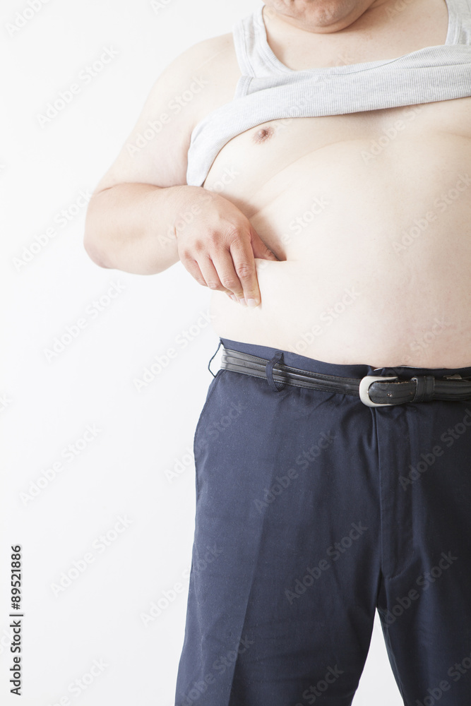 Naklejka premium お腹がきになる中年男性