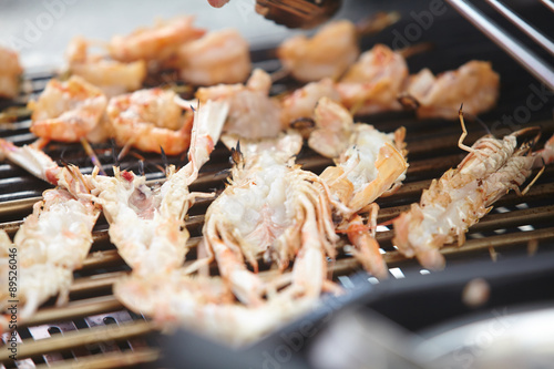 Shrimp on skewers on the grill