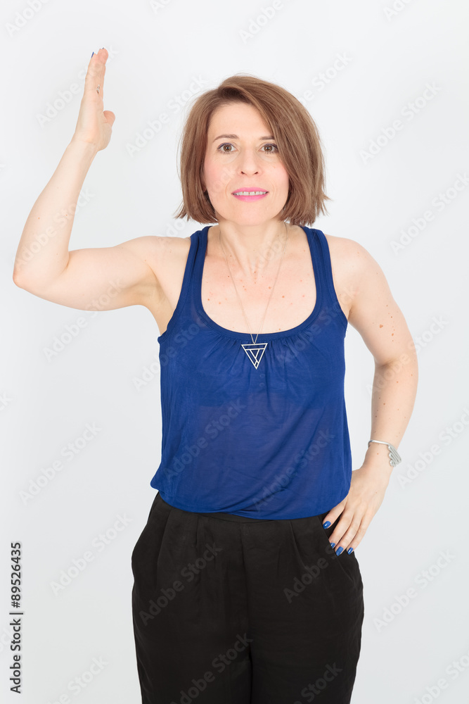 Beautiful woman doing different expressions in different sets of clothes: be careful Beautiful woman doing different expressions in different sets of clothes: be careful