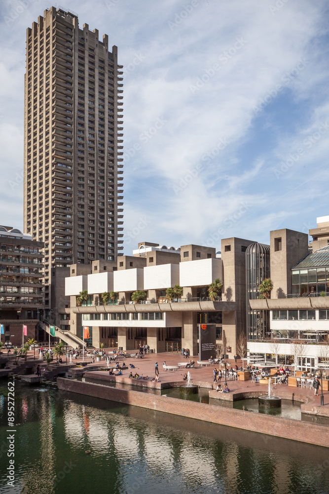 Naklejka premium Barbican Centre, London. Lakeside view of the landmark London arts venue with its Brutalist concrete architecture.