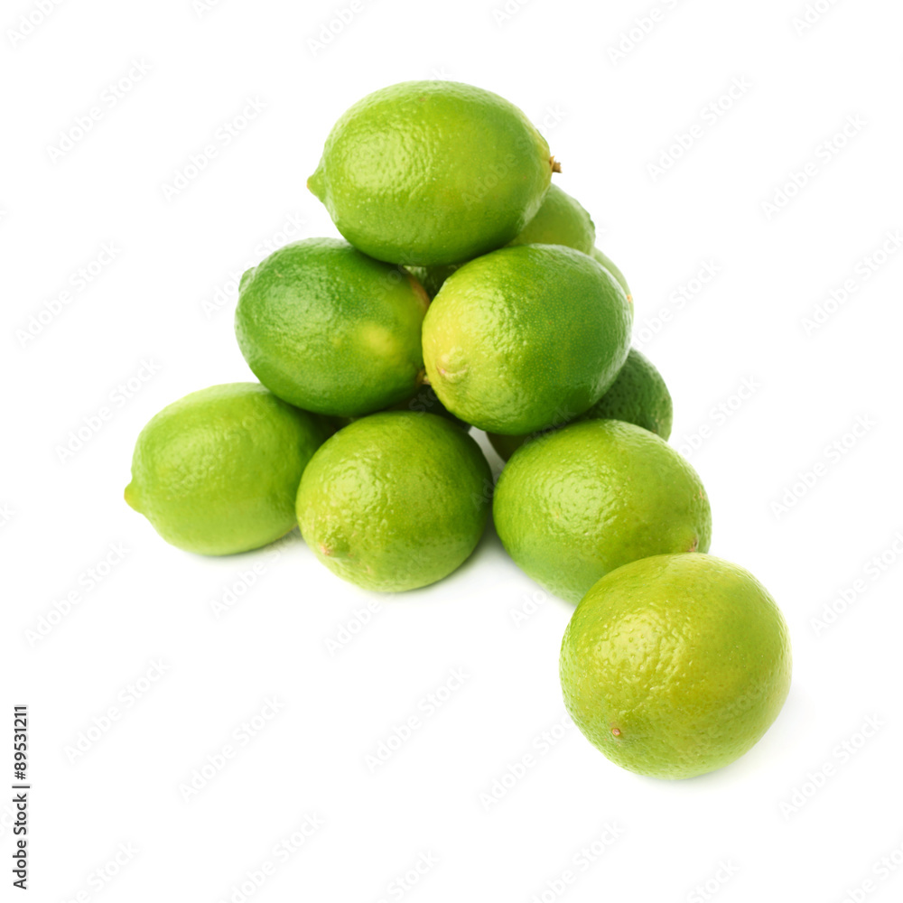 Pile of multiple ripe limes, composition isolated over the white Pile of multiple ripe limes, composition isolated over the white