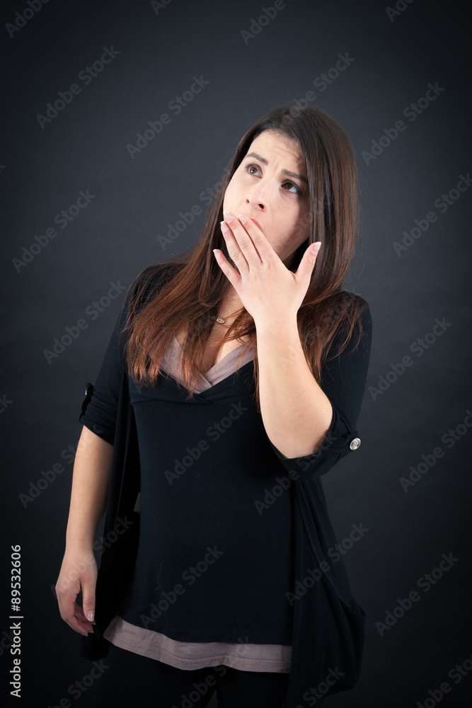 Beautiful woman doing different expressions in different sets of clothes: yawn Beautiful woman doing different expressions in different sets of clothes: yawn