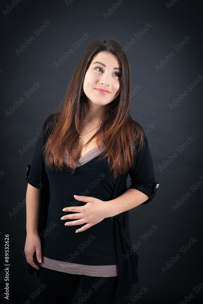 Beautiful woman doing different expressions in different sets of clothes: hungry Beautiful woman doing different expressions in different sets of clothes: hungry