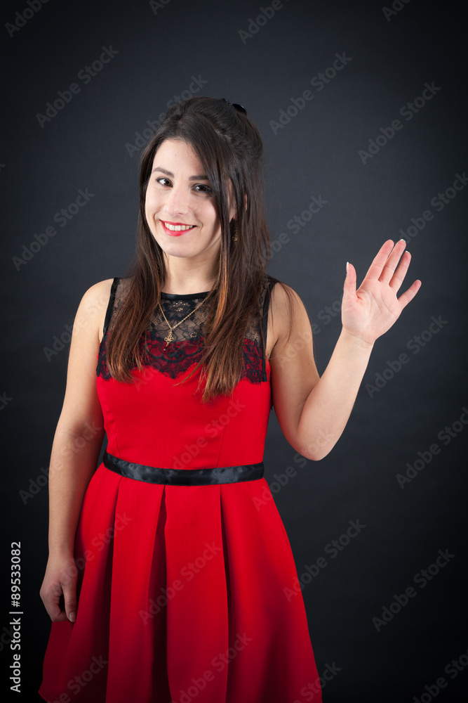 Beautiful woman doing different expressions in different sets of clothes: waving Beautiful woman doing different expressions in different sets of clothes: waving