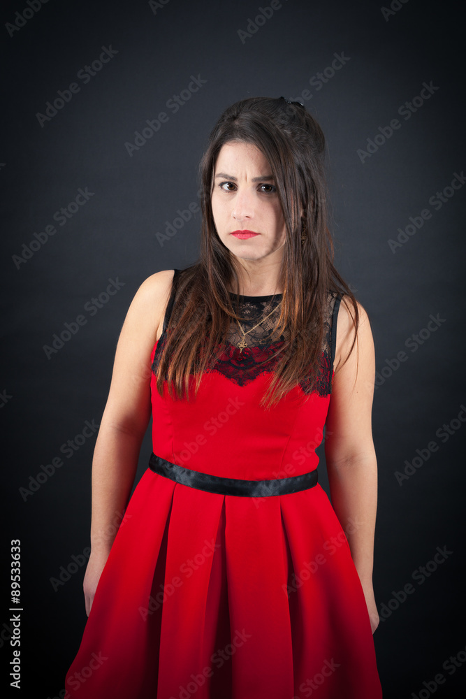 Beautiful woman doing different expressions in different sets of clothes: angry Beautiful woman doing different expressions in different sets of clothes: angry
