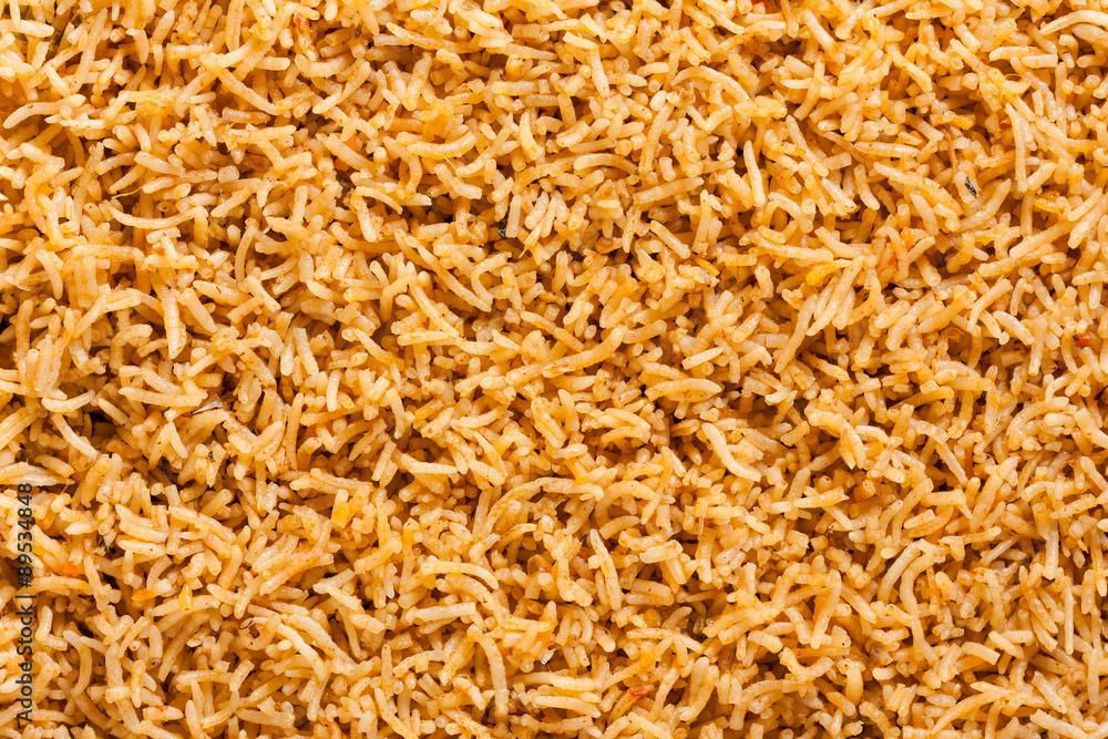Plain biryani overhead view - Overhead view from the top of delicious plain biryani (kuska) made with basmati rice and various spices. Natural light used. Plain biryani overhead view - Overhead view from the top of delicious plain biryani (kuska) made with basmati rice and various spices. Natural light used.
