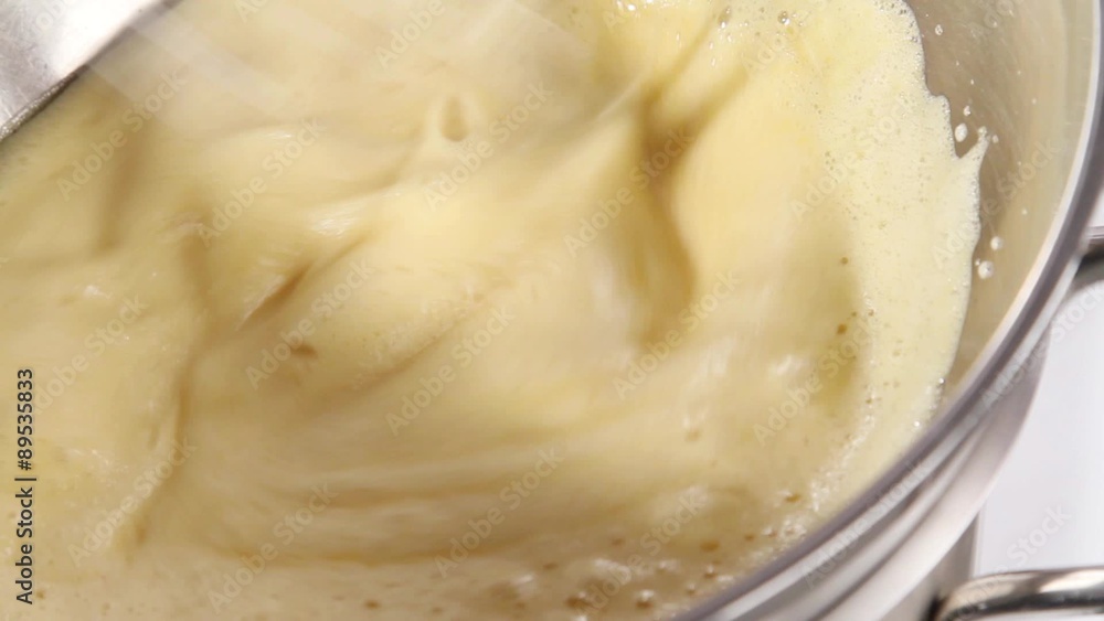 Whisking zabaglione until pale and fluffy Whisking zabaglione until pale and fluffy