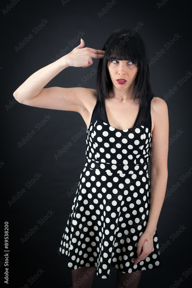 Beautiful woman doing different expressions in different sets of clothes: suicide Beautiful woman doing different expressions in different sets of clothes: suicide