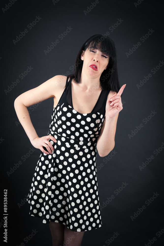 Fototapeta premium Beautiful woman doing different expressions in different sets of clothes: drunk