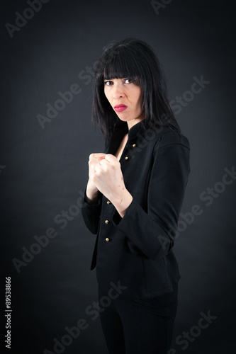 Beautiful woman doing different expressions in different sets of clothes: boxe