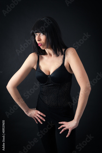 Beautiful woman doing different expressions in different sets of clothes: posing