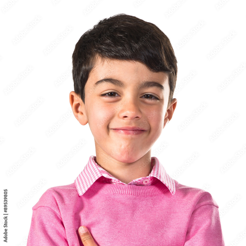 Brunette kid with his arms crossed Brunette kid with his arms crossed