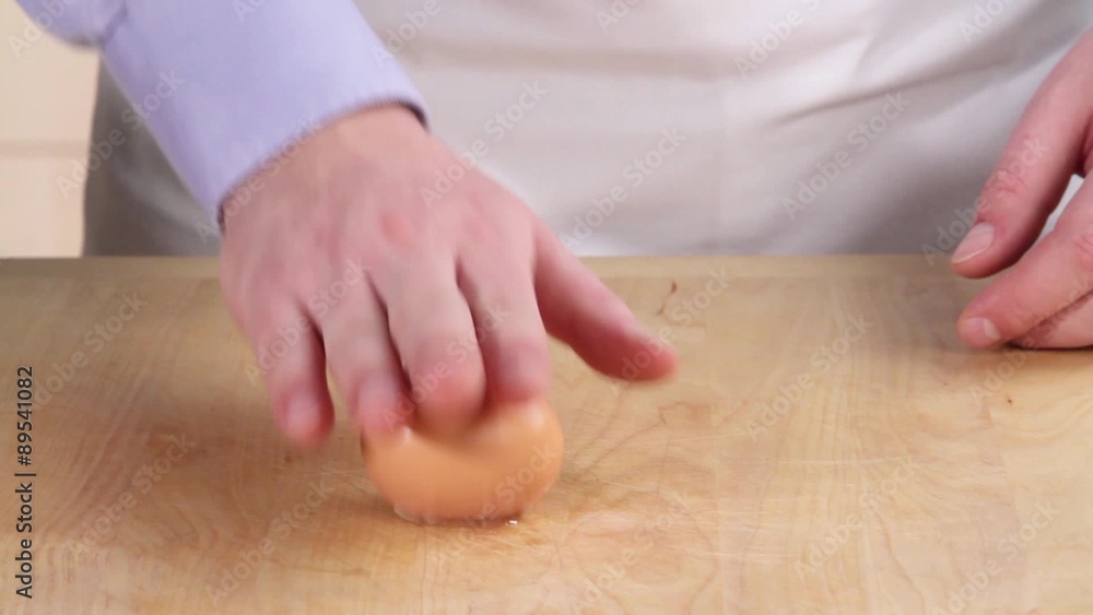 A hard boiled egg being peeled