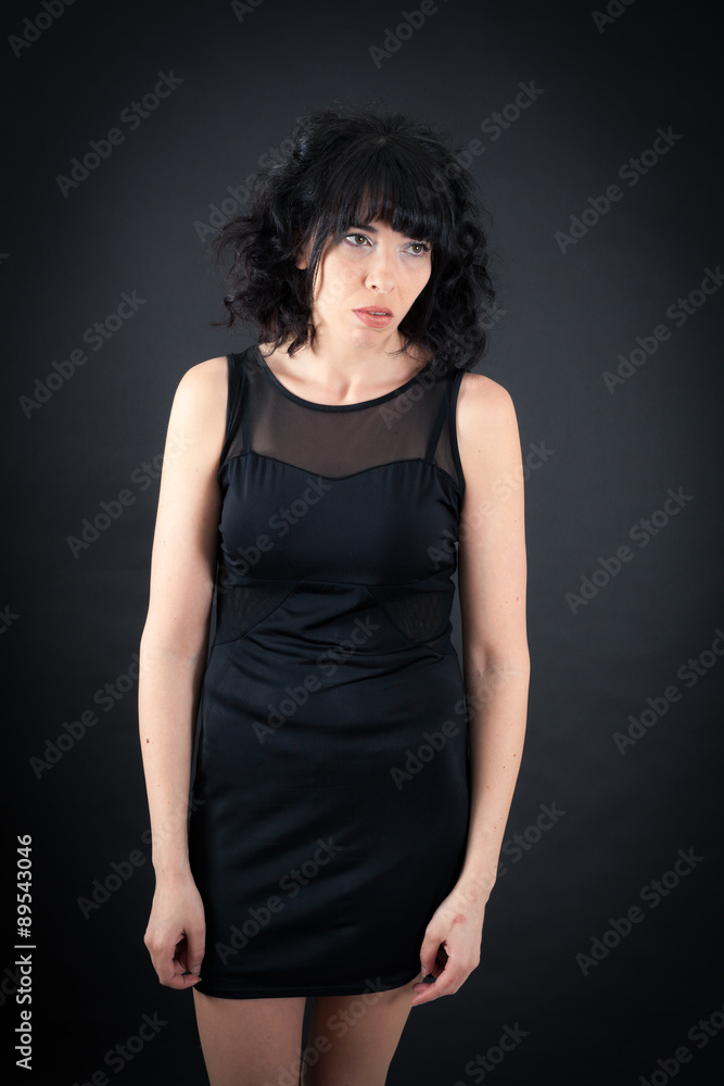 Beautiful woman doing different expressions in different sets of clothes: sad Beautiful woman doing different expressions in different sets of clothes: sad