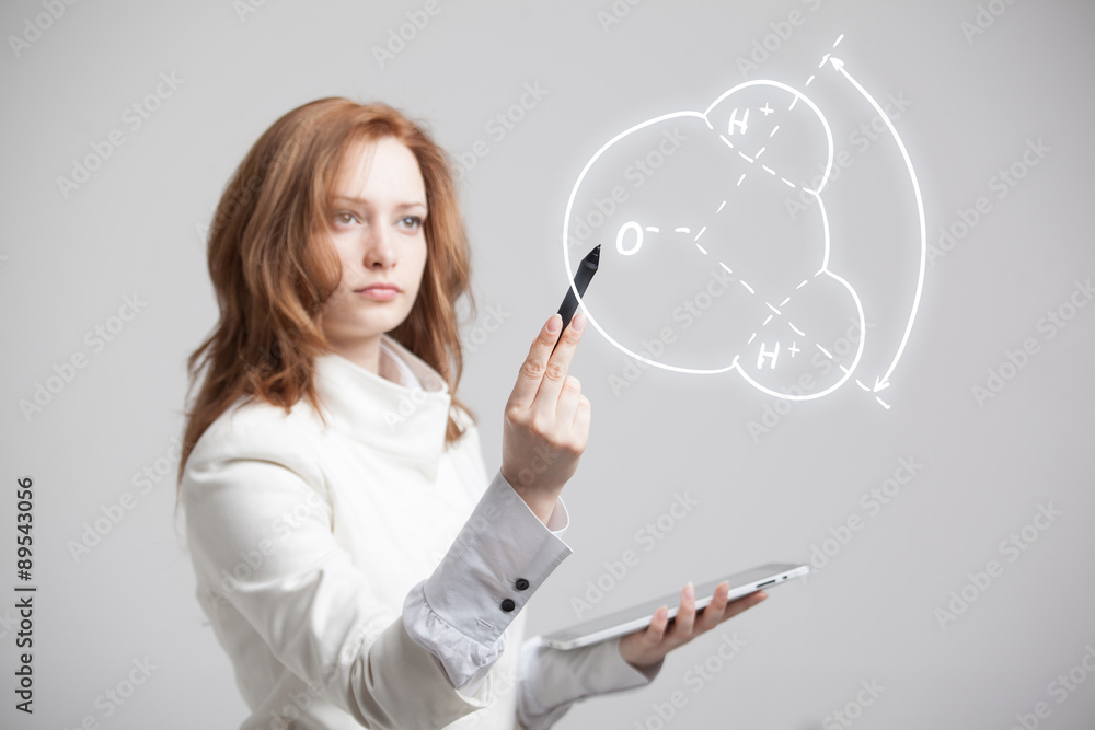woman draws water molecule woman draws water molecule