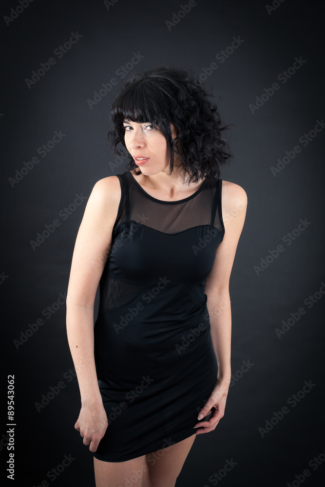 Beautiful woman doing different expressions in different sets of clothes: love Beautiful woman doing different expressions in different sets of clothes: love
