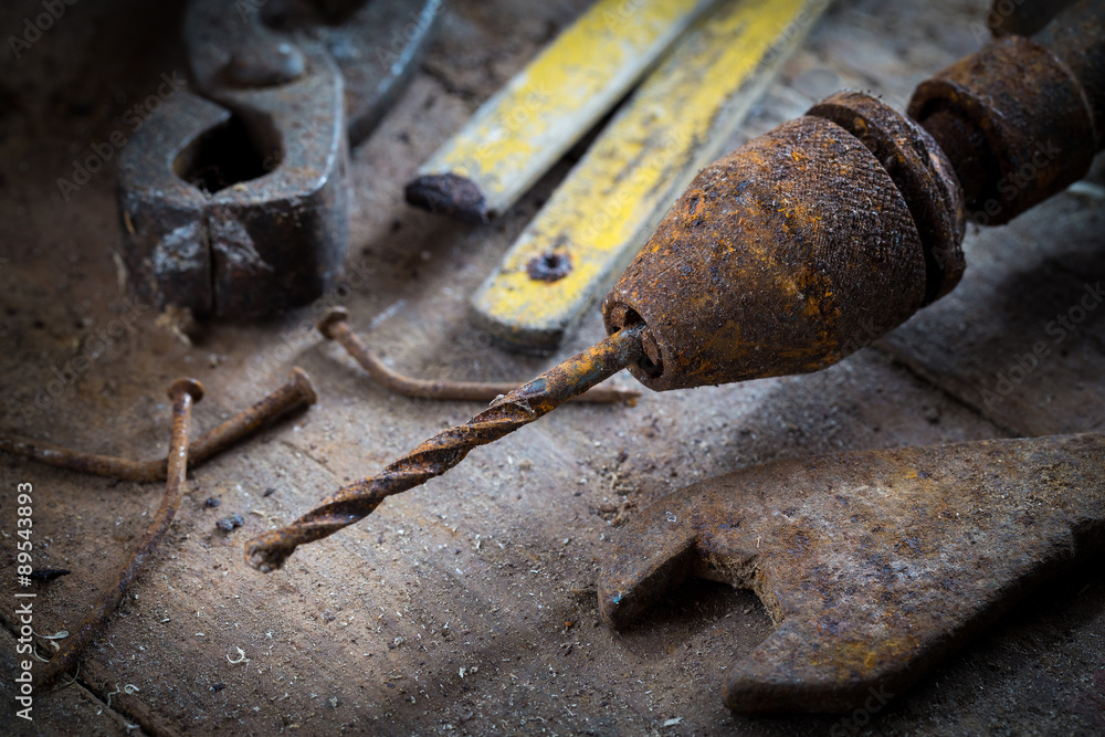 Old rusty tools in the workshop