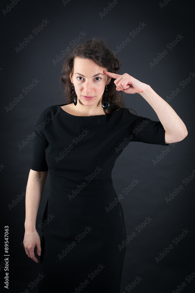 Beautiful woman doing different expressions in different sets of clothes: you are crazy Beautiful woman doing different expressions in different sets of clothes: you are crazy