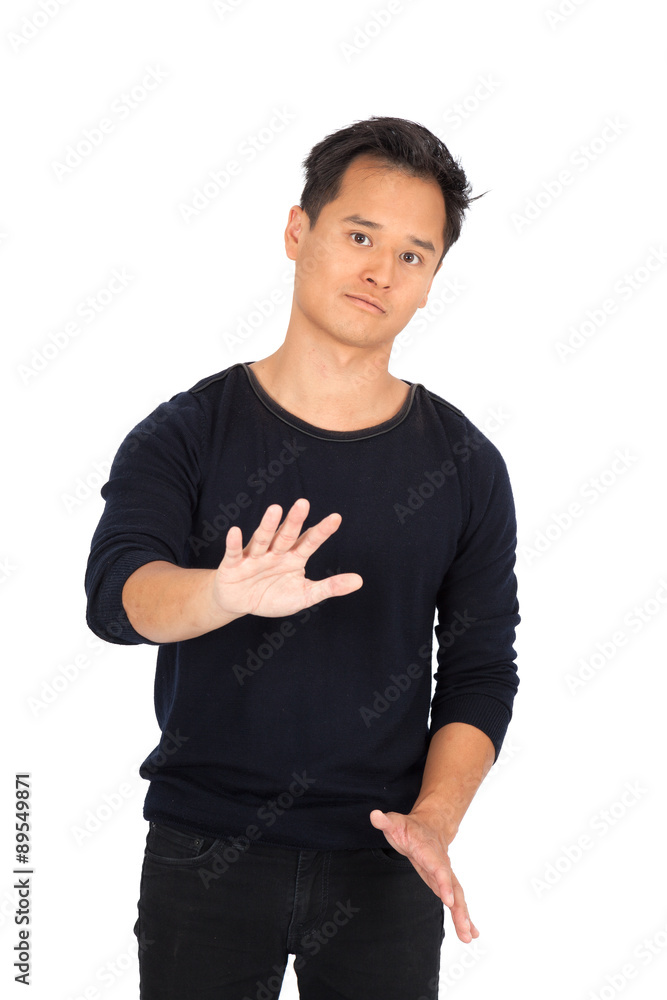 Handsome man doing different expressions in different sets of clothes: stop sign Handsome man doing different expressions in different sets of clothes: stop sign