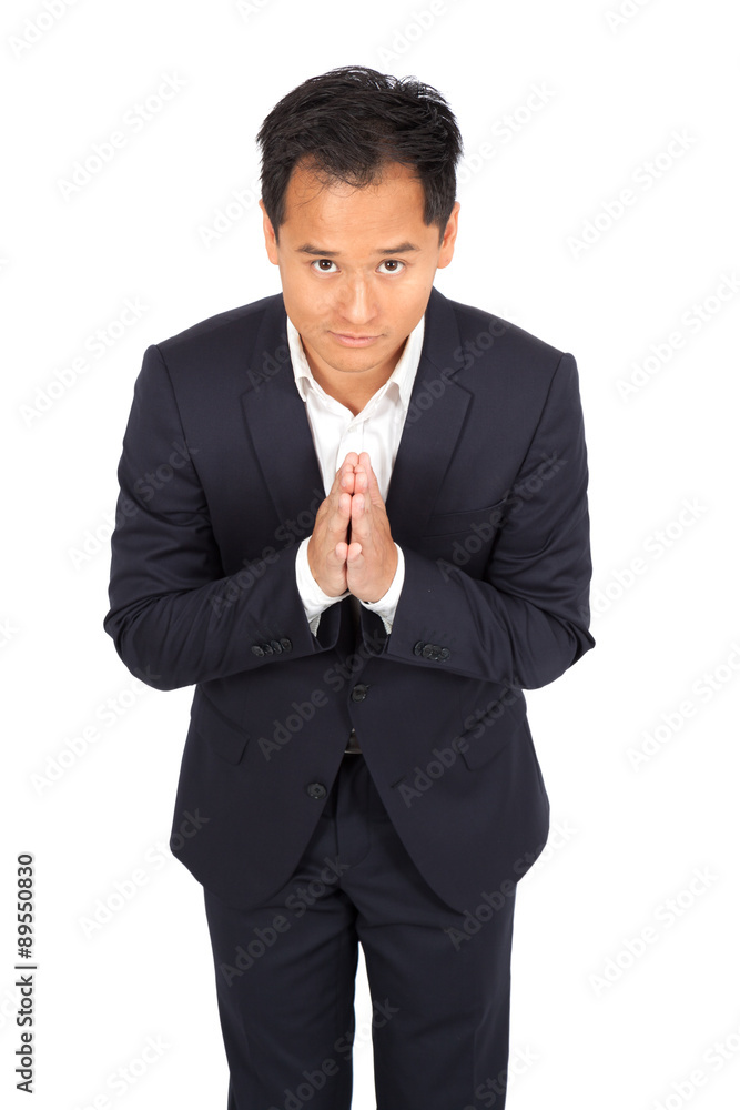 Handsome man doing different expressions in different sets of clothes: praying Handsome man doing different expressions in different sets of clothes: praying