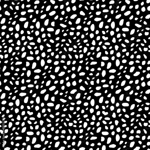 Black and white animal skin background. Abstract spots texture. Seamless leopard pattern.