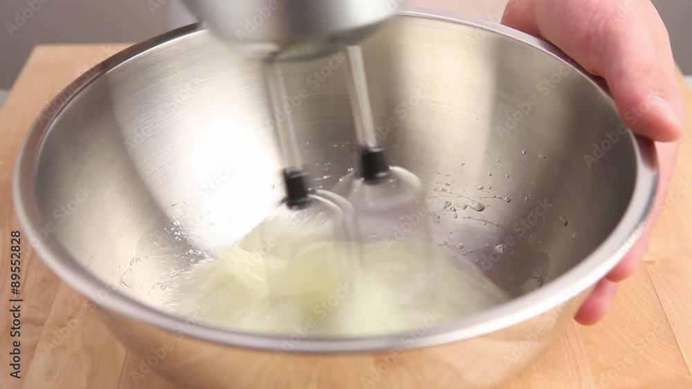 Beating egg white stiffly Beating egg white stiffly