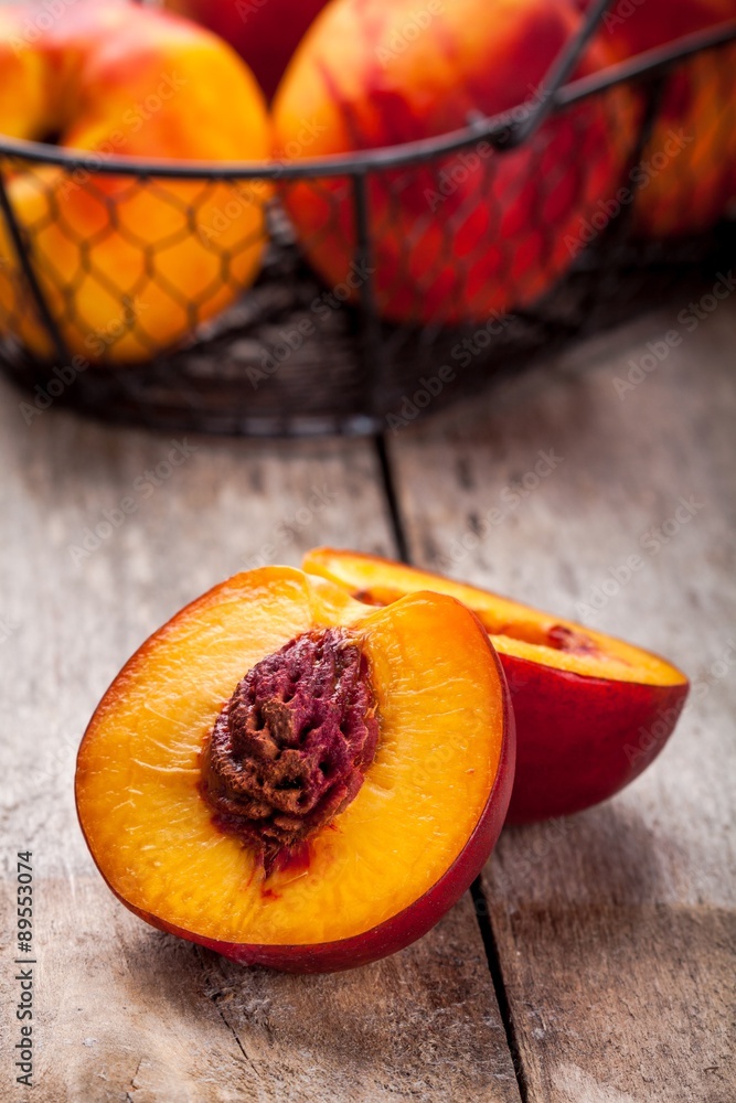 fresh organic nectarines in a basket closeup